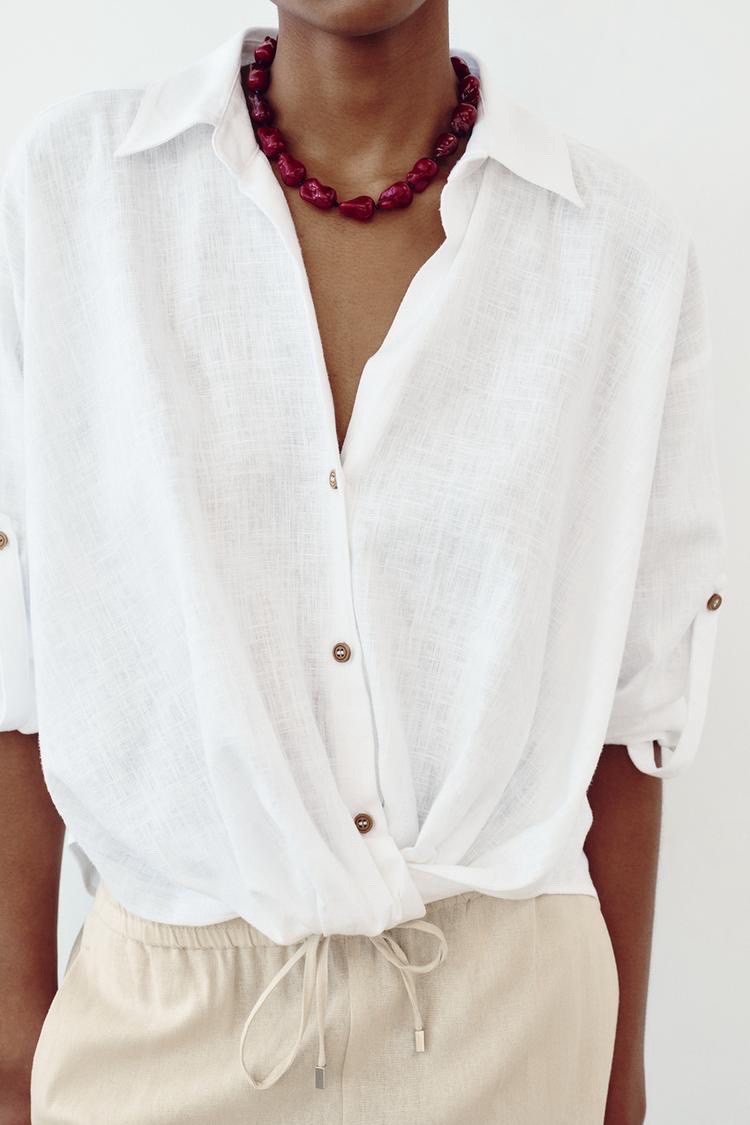 Chemise blanche en lin de chez Zara se distingue par son détail de nœud à la taille ( taille L 40 )
