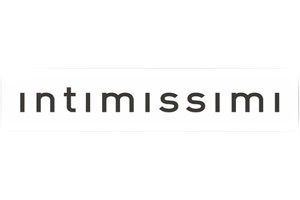 String de la marque Intimissimi, caractérisé par un motif à rayures multicolores et un petit nœud décoratif taille 38/40
