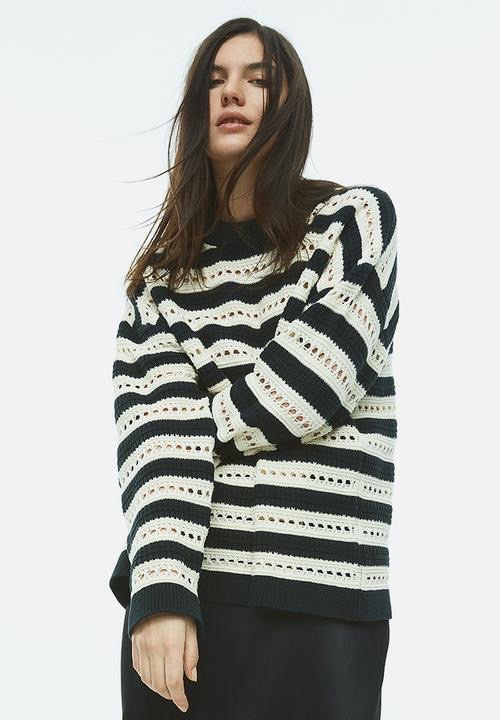 OVERSIZED POINTELLE KNIT SWEATER