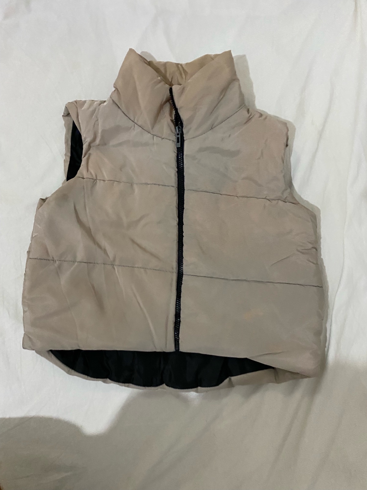 Veste beige sans manches