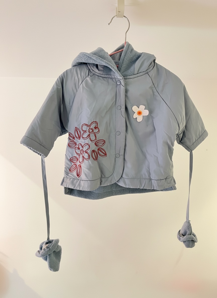 Blouson pour bébé de couleur bleu ciel