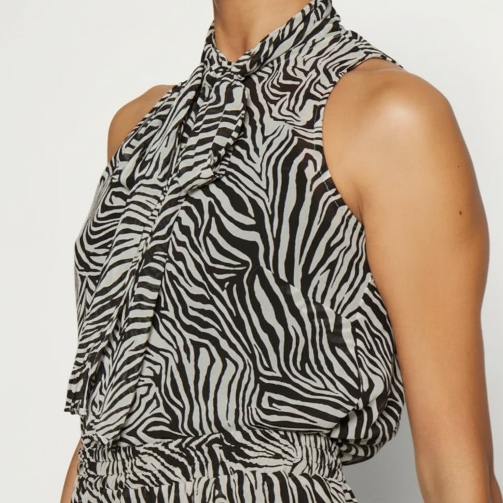 Très jolie robe zèbre plissée 