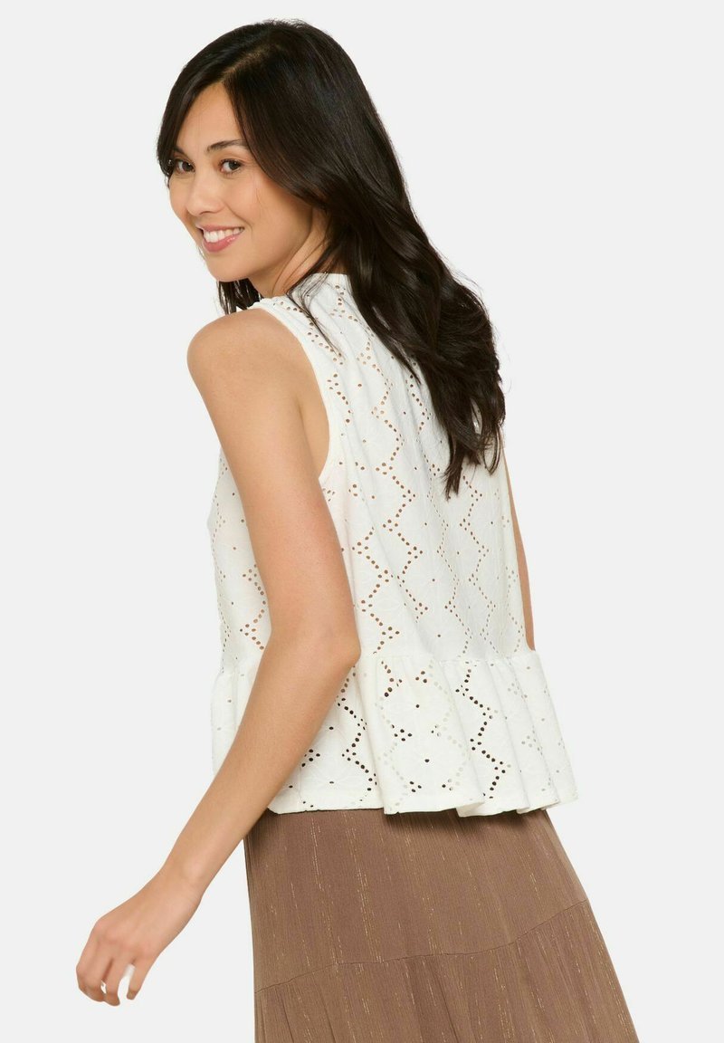 Magnifique blouse en dentelle