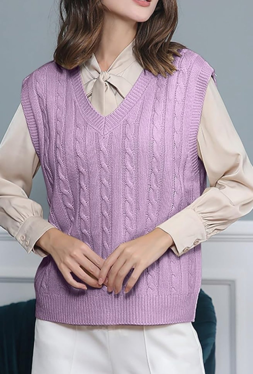 Magnifique pull sans manches
