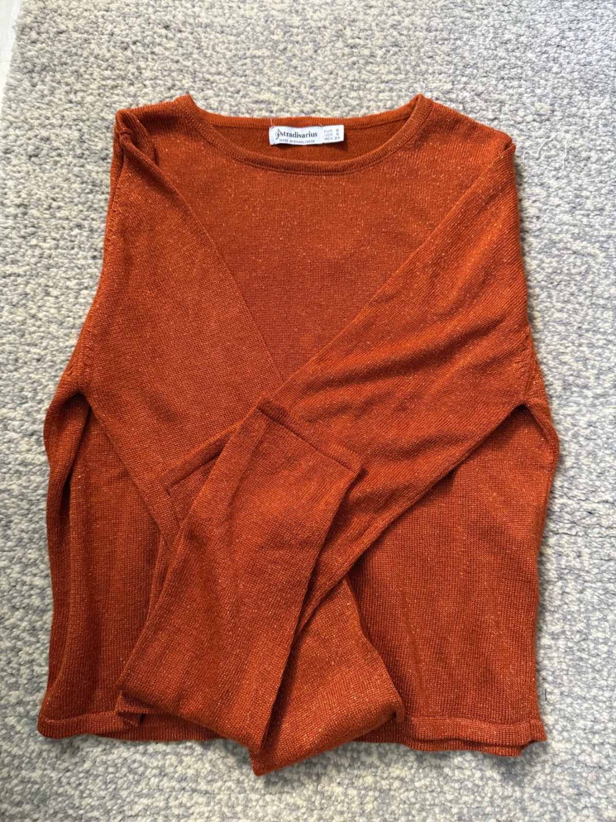 Pull court orange pailleté