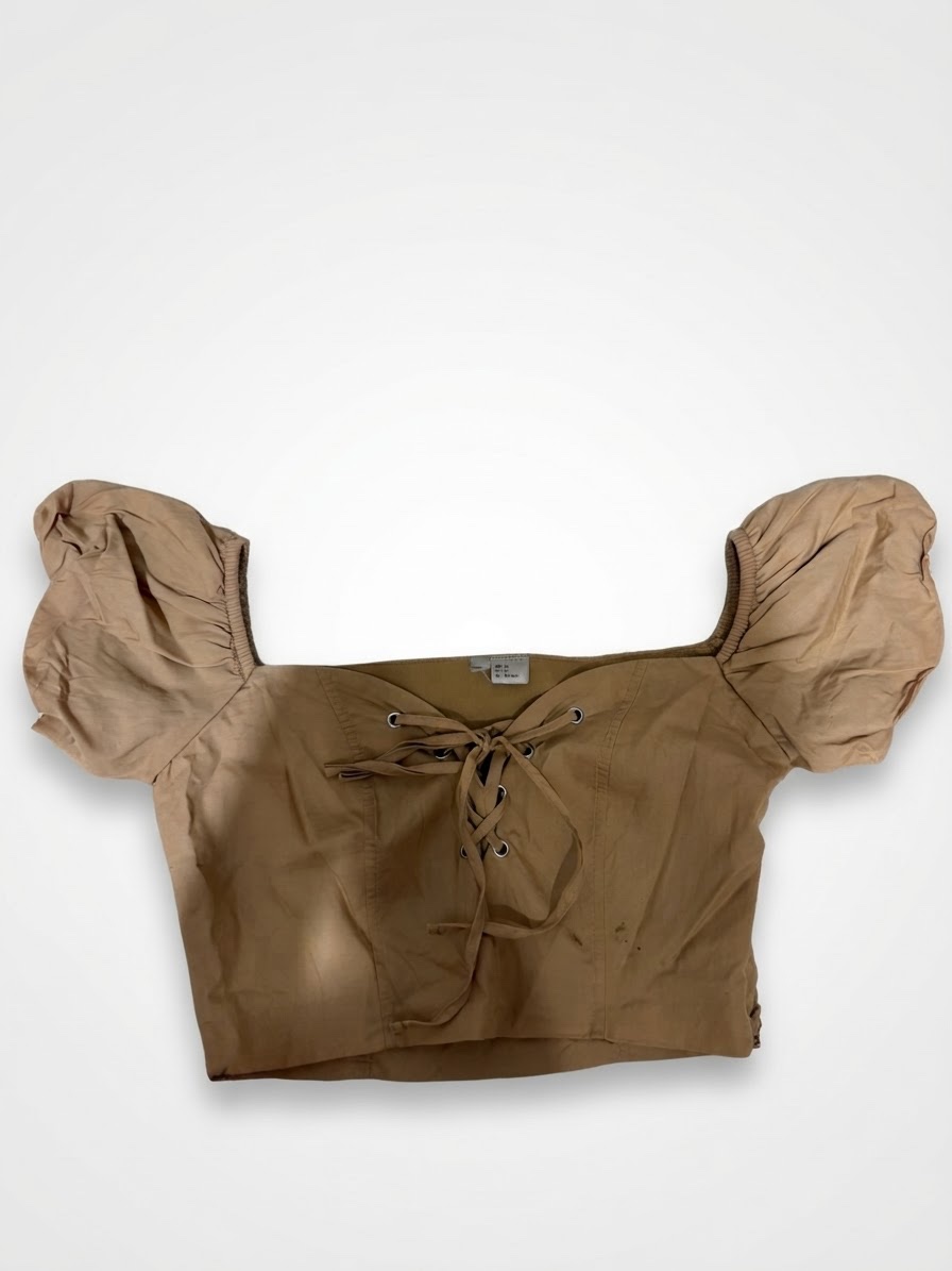 Top beige avec manches bouffantes