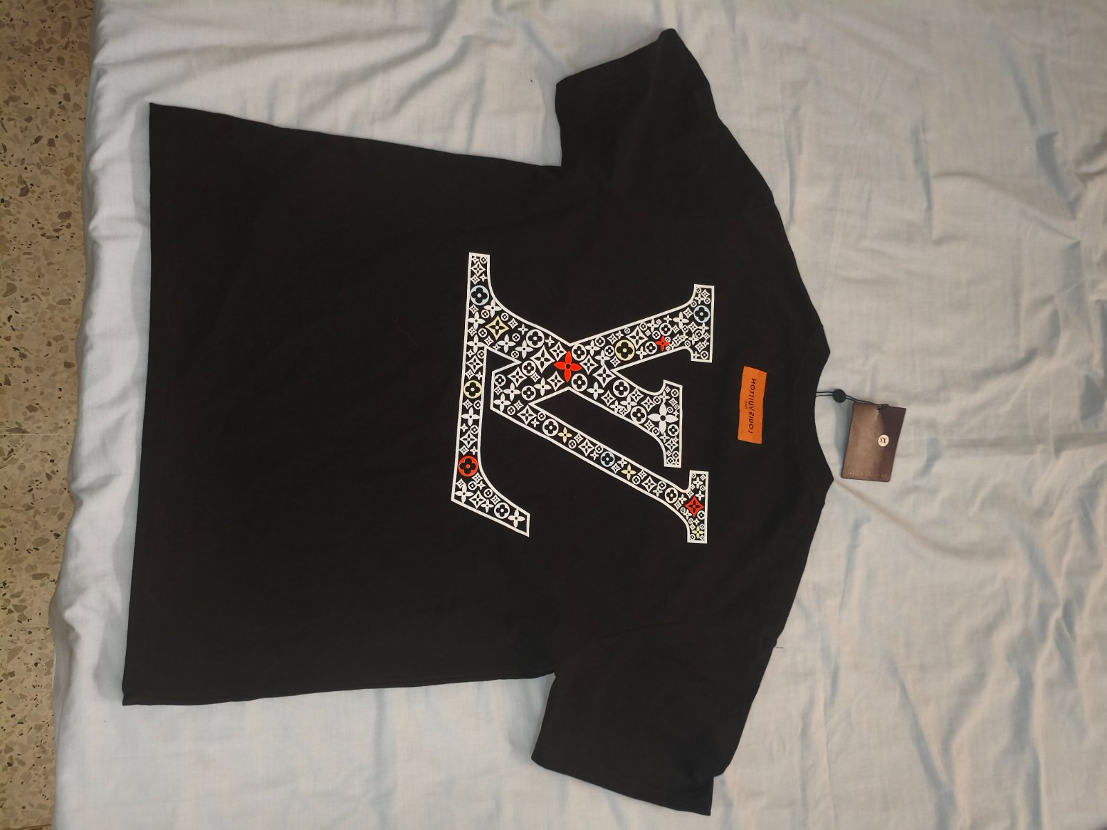 T 