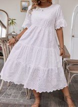 Très belle robe à volants en broderie anglaise importée jamais portée à ne pas rater