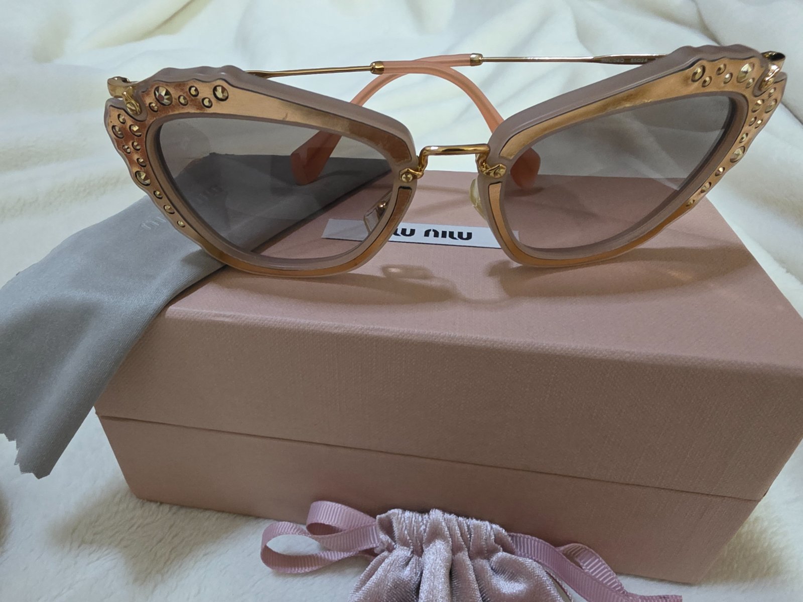 Lunettes MIU MIU