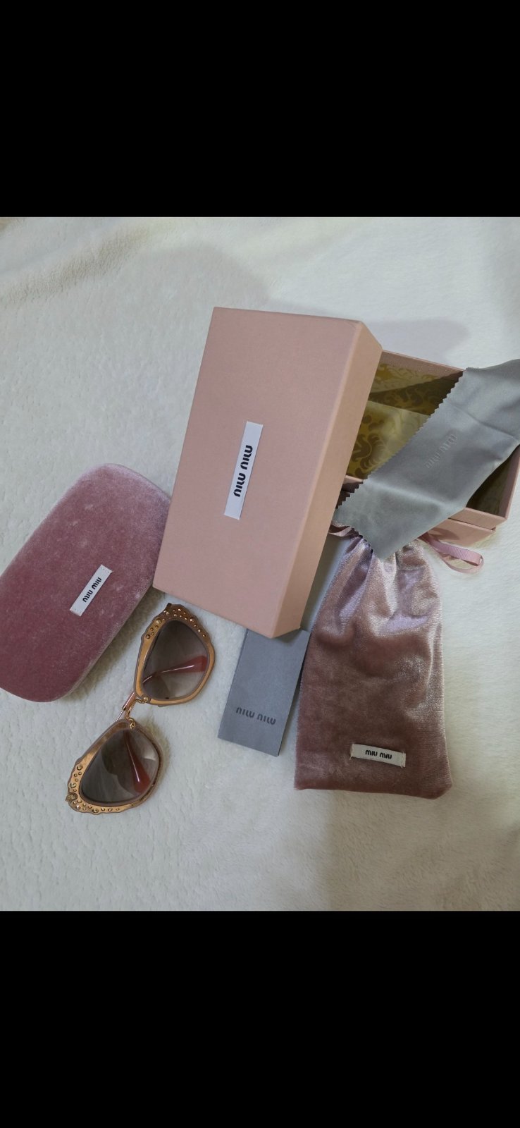 Lunettes MIU MIU