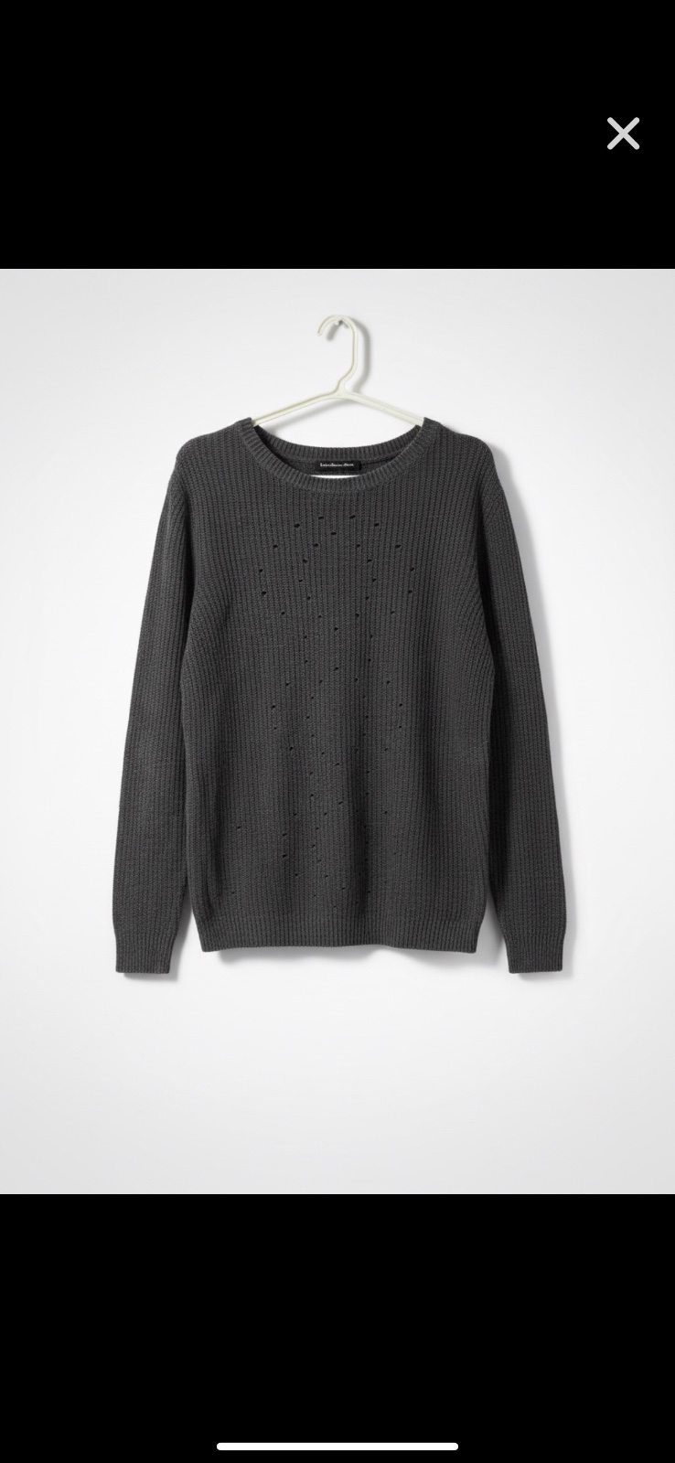 Pull en maille gris anthracite avec détails ajourés