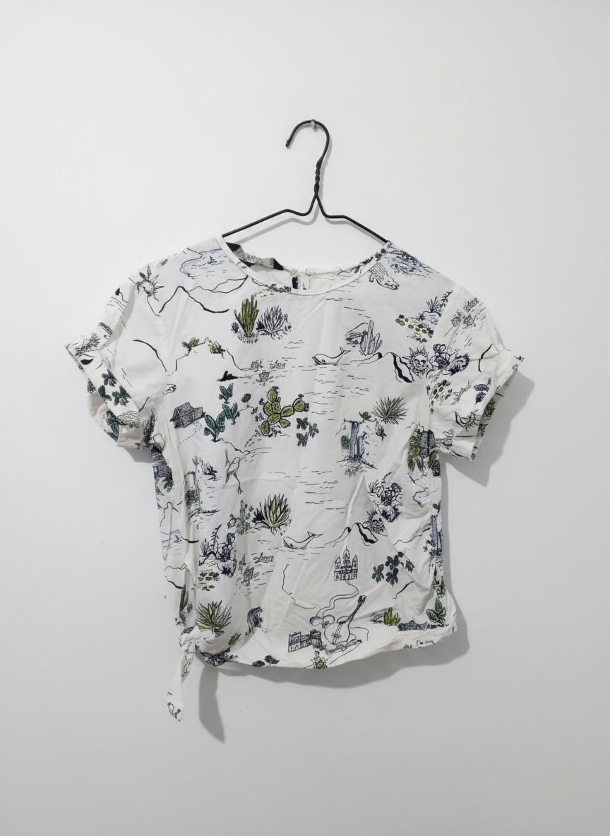 Haut Zara blanc avec motifs imprimés et nœud 