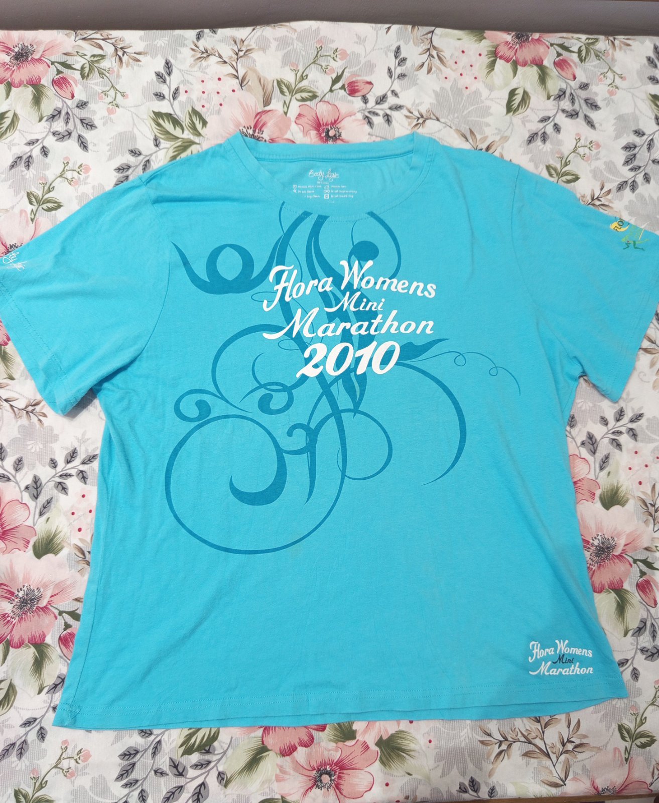 T-shirt turquoise – Taille 22 👕