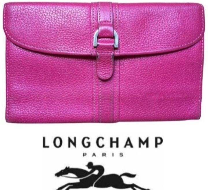🌀🌀 Portefeuille en cuir rose de la marque Longchamp je baisse a cause de ce leger défaut