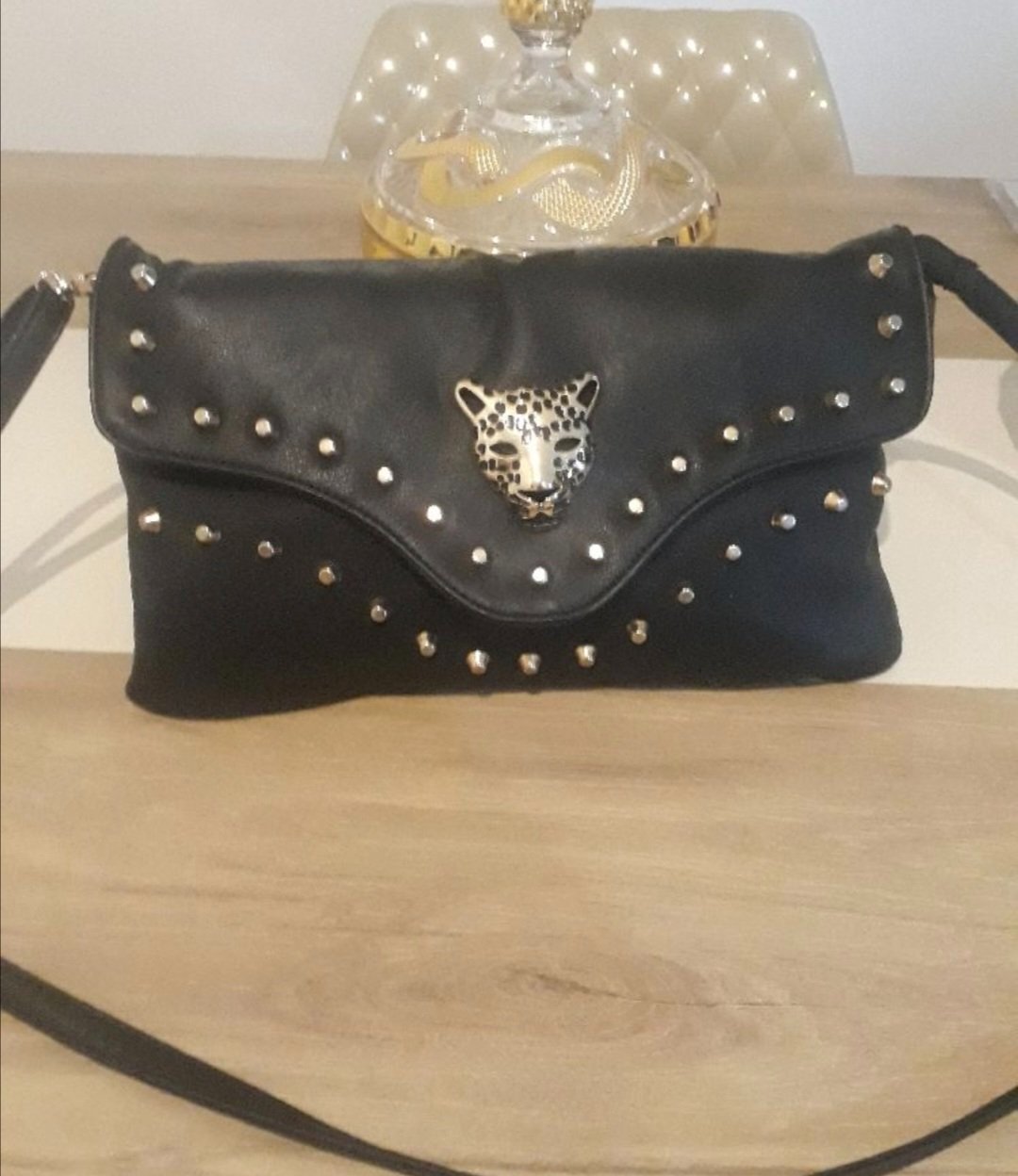 🫆🫆 Pochette avec un joli désigne en tête de lion