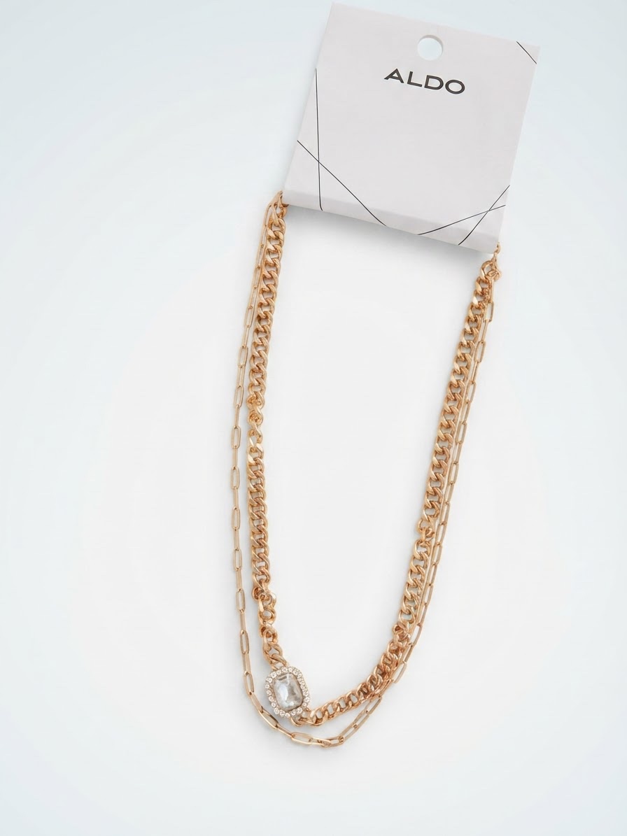 Aldo Deux Coliers dorés liés avec des strass 