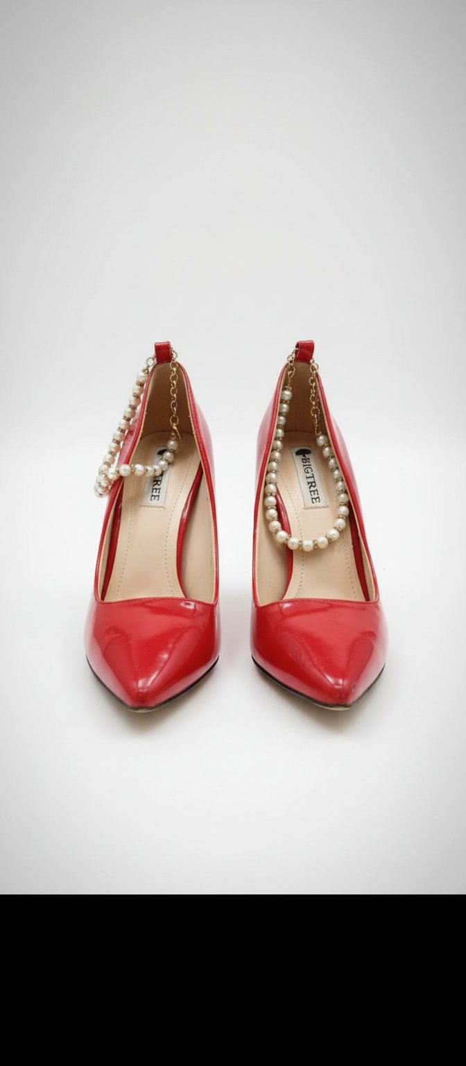 Talon soirée couleur rouge pointure 39 just thama ta9chira men de5il mais façade sans défaut 