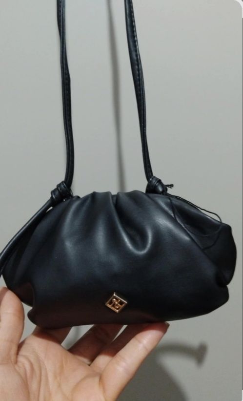Mini sac a man  a bandoulière la marque call it spring