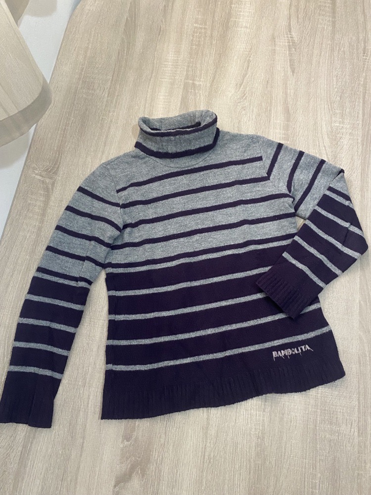 Pull col montant