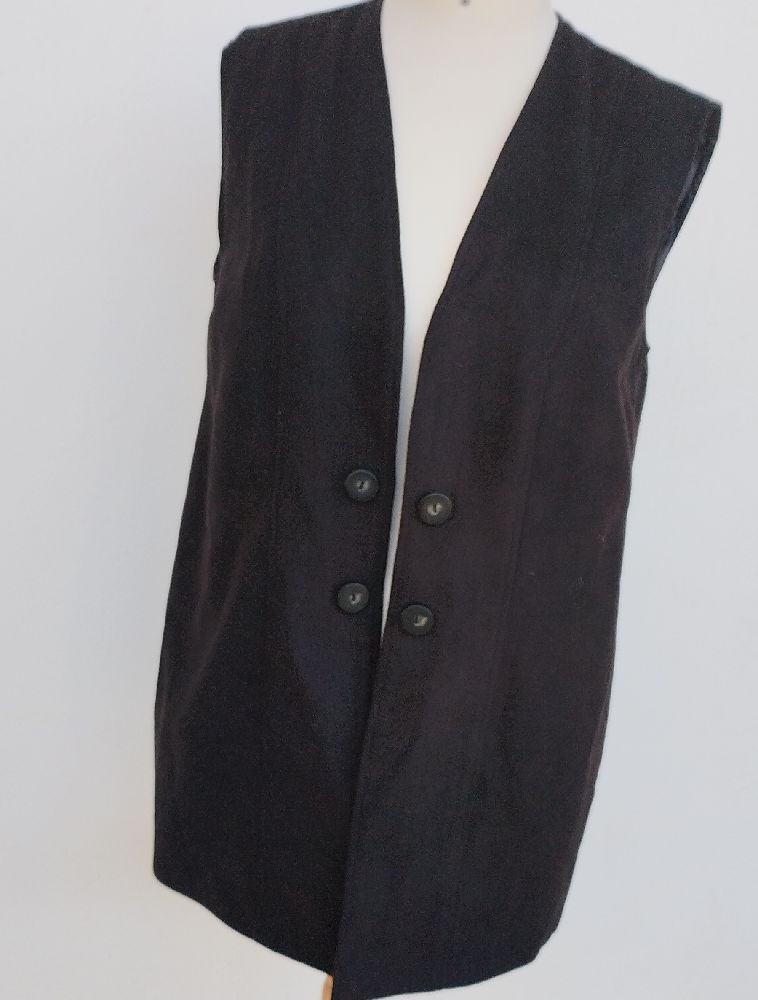 veste mi-long sans manches