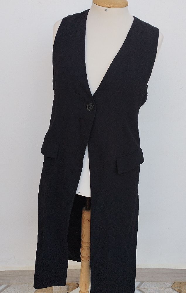 veste longue sans manches