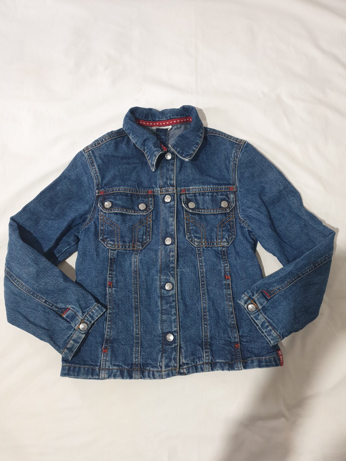 Une veste en jean Diesel De-Bonny de couleur bleu indigo et pull pour fille taille 10ans