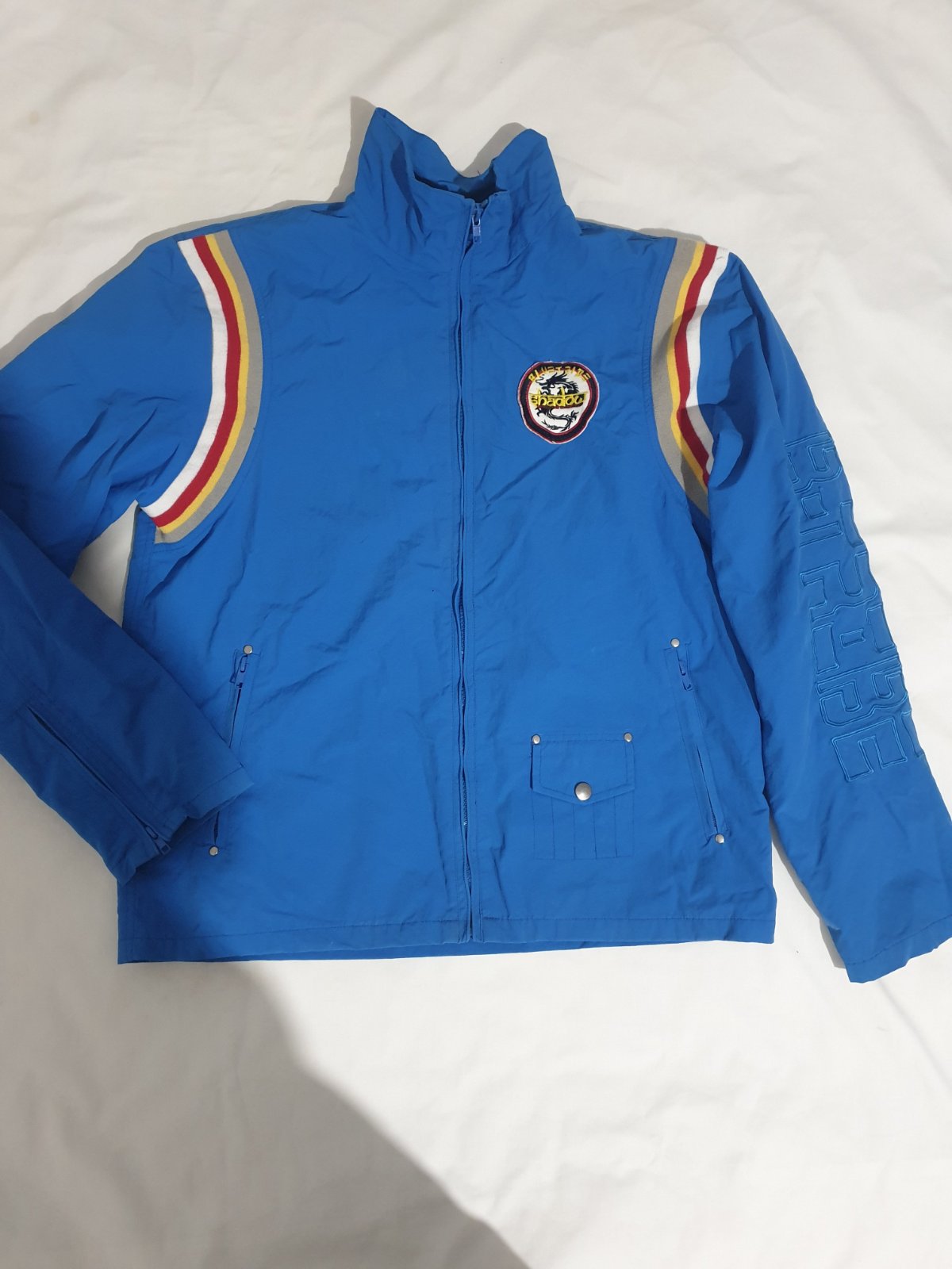 Une veste Napapijri pour homme de couleur bleu vif taille L