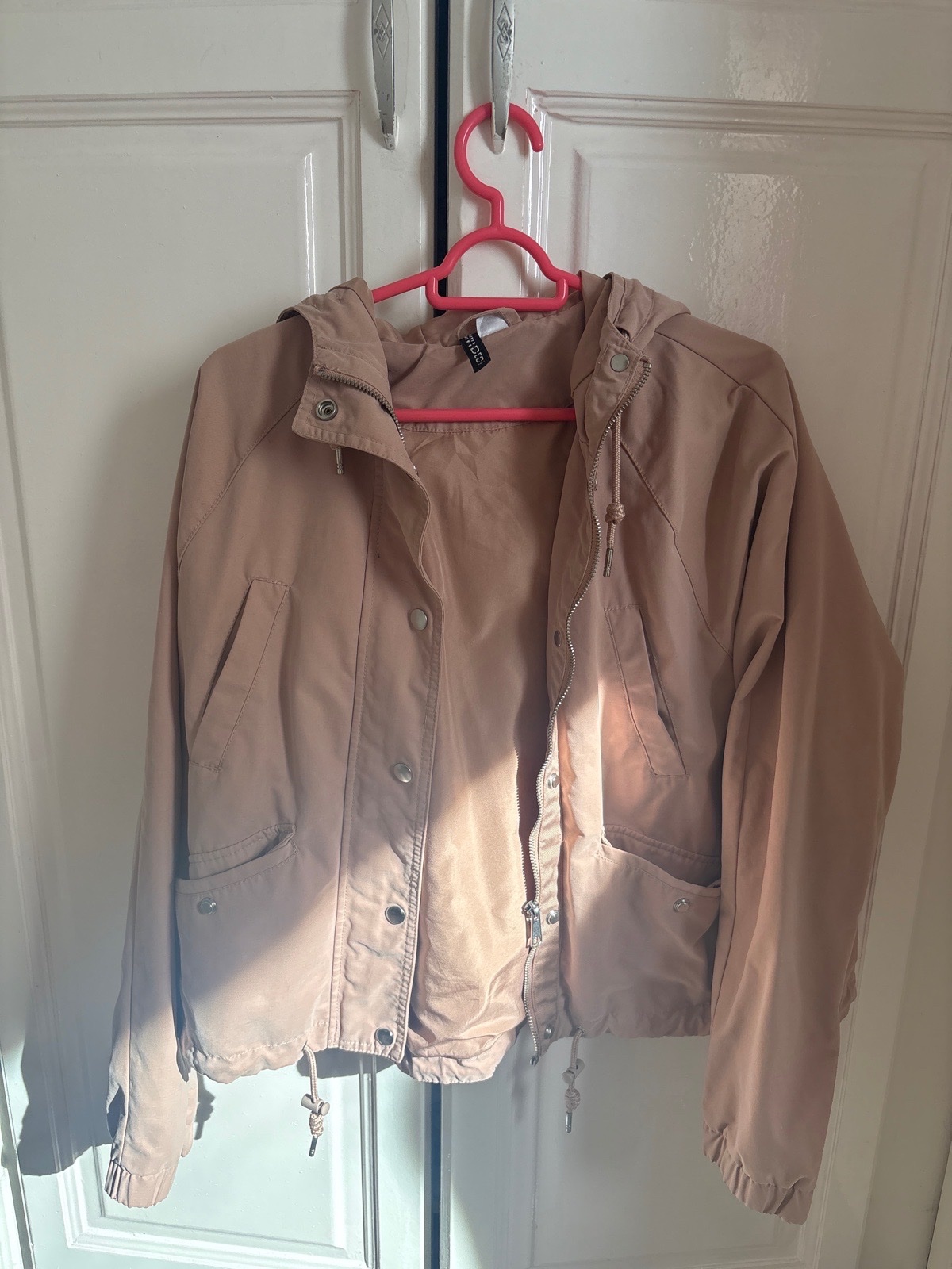 Veste rose poudré