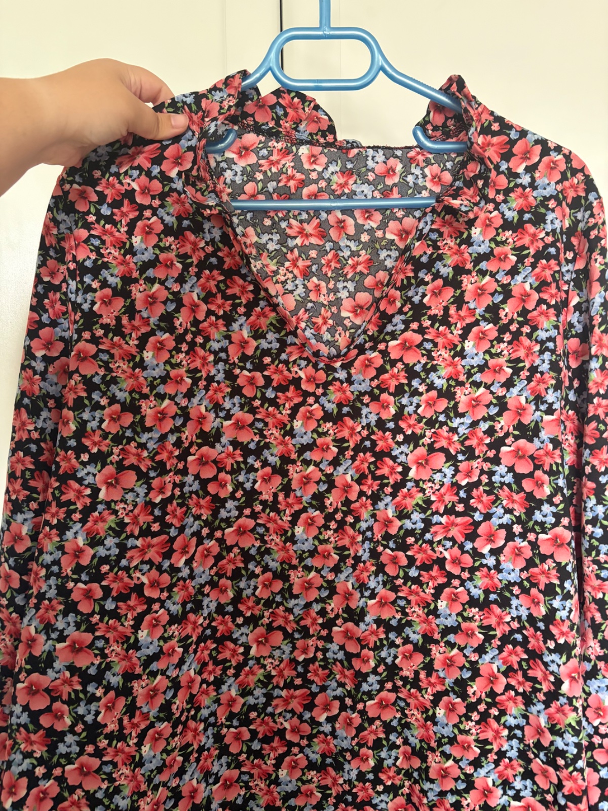 Tunique en très bon état avec des motifs floral