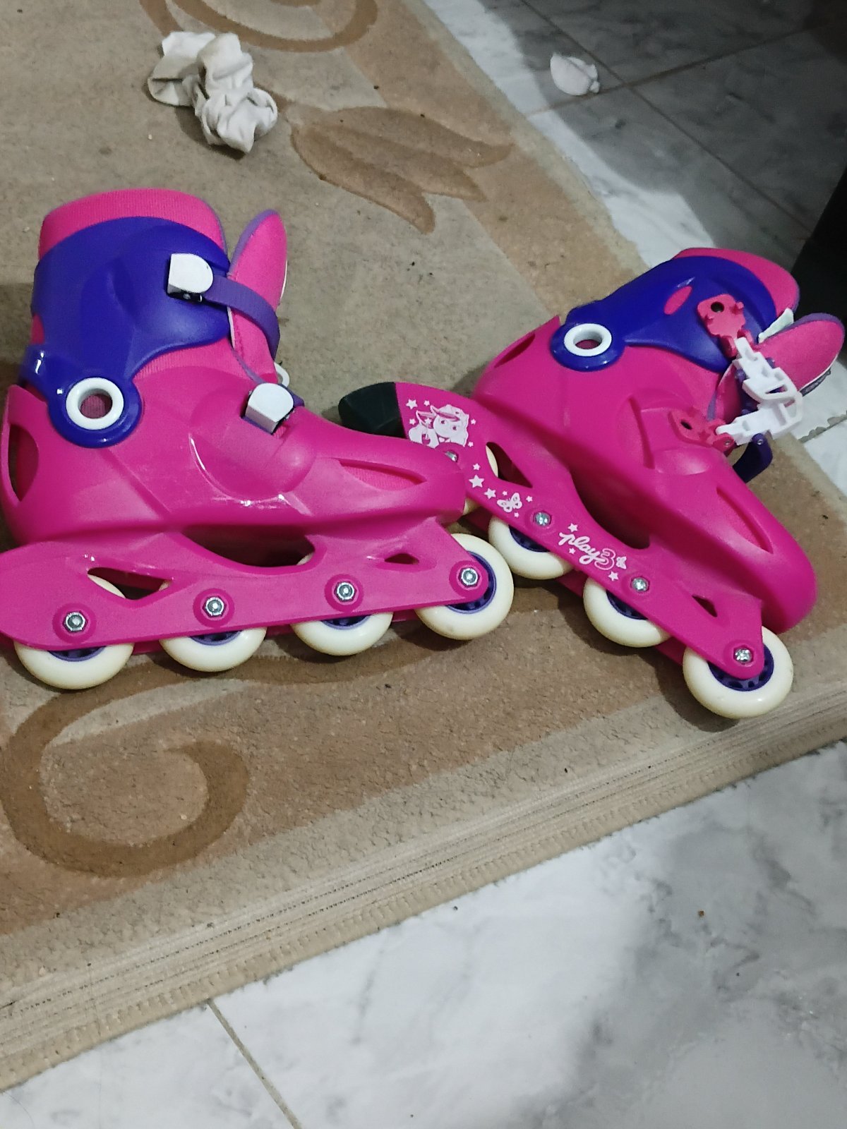 Patin à roulette rose pour des enfants de 9-10ans 