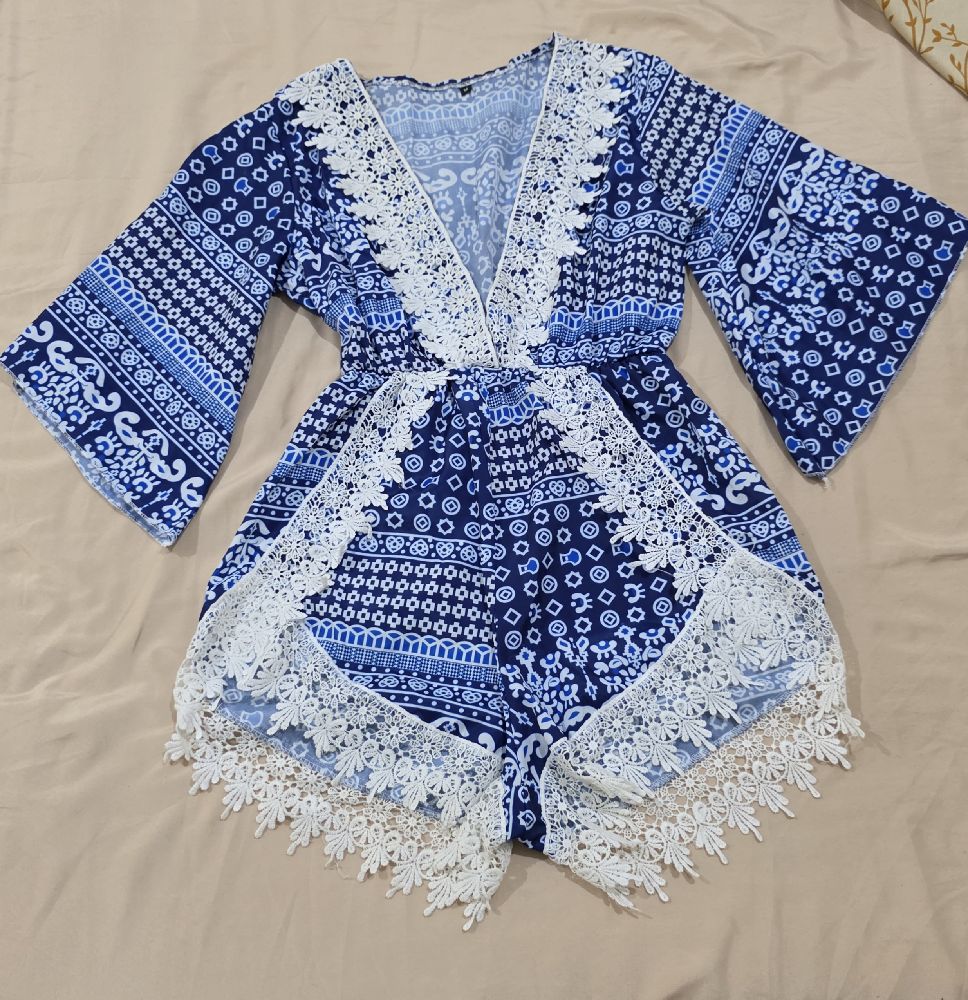 Combi-short de plage convient à la taille M et L