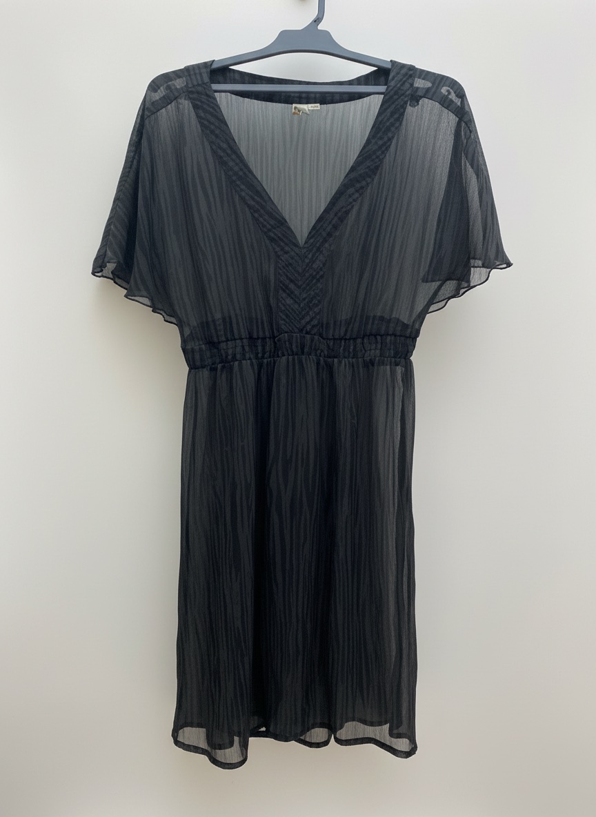 Cache-maillot noir.