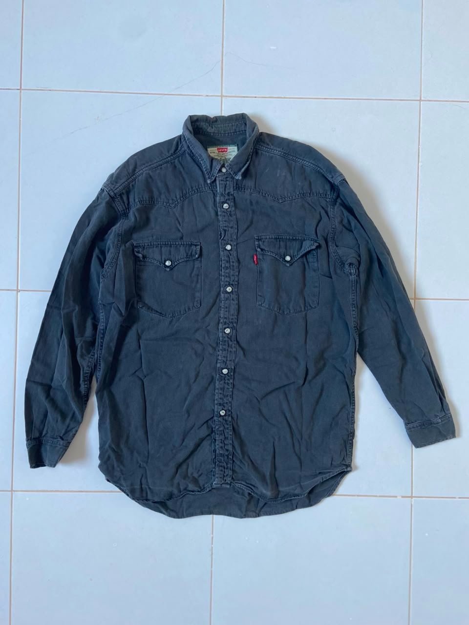 Chemise en jean vintage Levi's arbore une coupe de style western