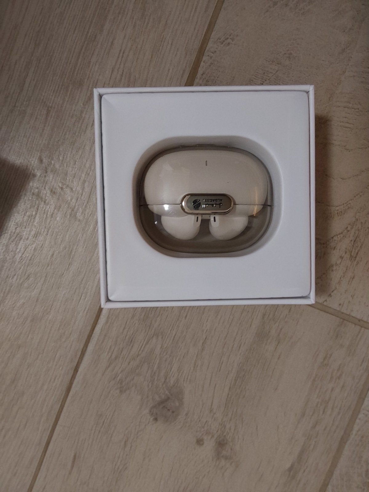 Earbuds doré et blanc