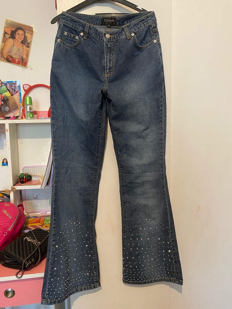 Un jean taille haute patte d elephant taille S 